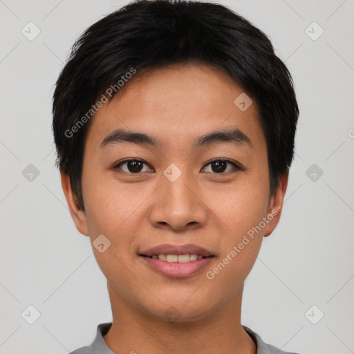 Joyful asian young-adult male with short  black hair and brown eyes