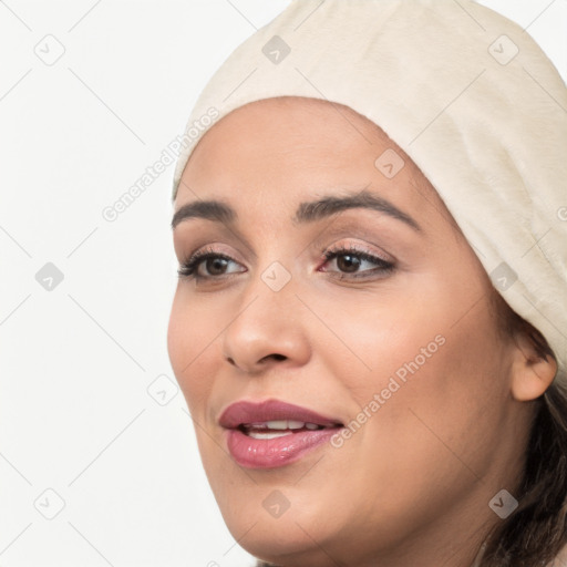 Joyful white young-adult female with long  black hair and brown eyes