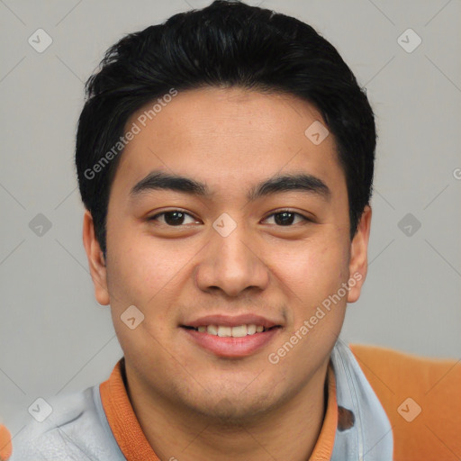 Joyful asian young-adult male with short  brown hair and brown eyes