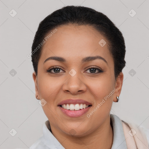 Joyful latino young-adult female with short  brown hair and brown eyes