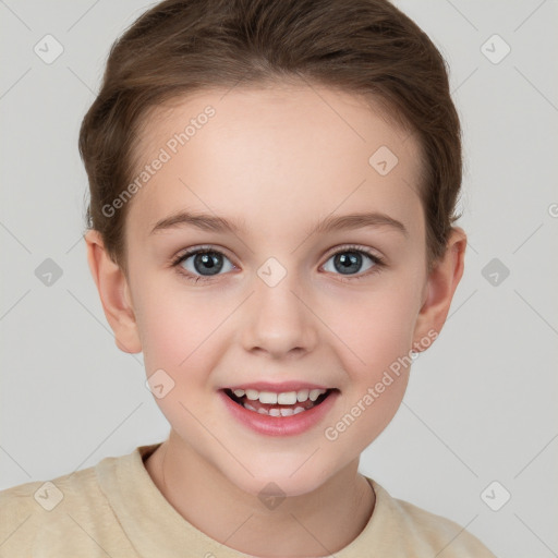 Joyful white child female with short  brown hair and grey eyes