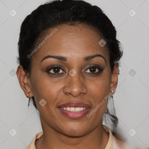 Joyful black adult female with short  brown hair and brown eyes