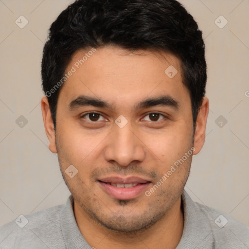 Joyful asian young-adult male with short  black hair and brown eyes