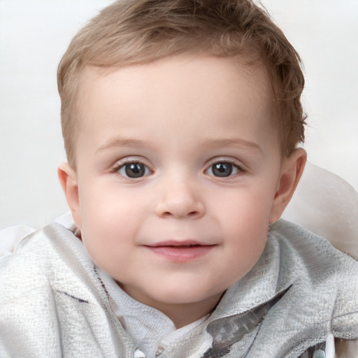 Joyful white child female with short  brown hair and blue eyes