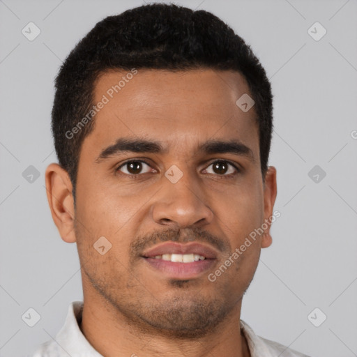Joyful latino young-adult male with short  brown hair and brown eyes