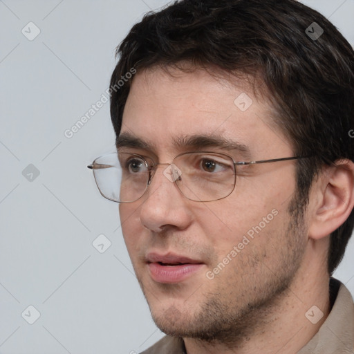 Neutral white adult male with short  brown hair and brown eyes