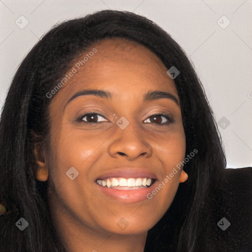 Joyful black young-adult female with long  brown hair and brown eyes