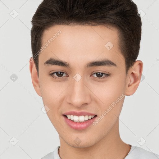 Joyful white young-adult male with short  brown hair and brown eyes