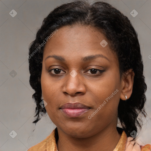 Joyful black young-adult female with medium  brown hair and brown eyes