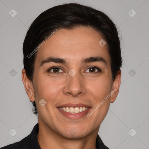 Joyful white adult female with short  brown hair and brown eyes