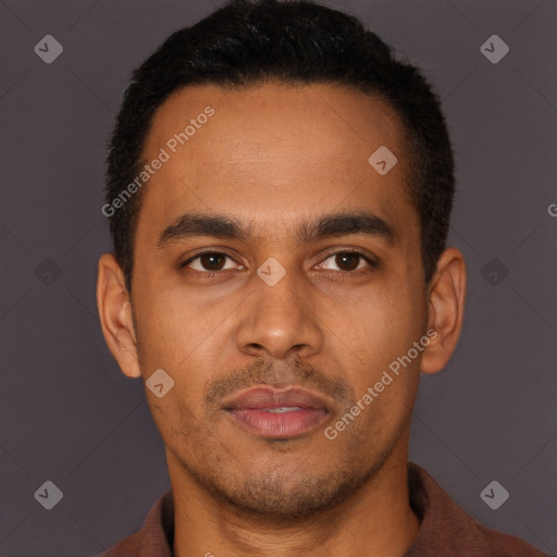 Joyful latino young-adult male with short  brown hair and brown eyes