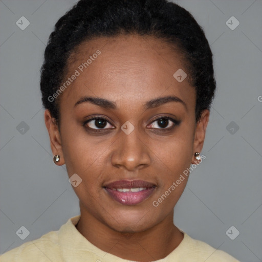 Joyful black young-adult female with short  black hair and brown eyes