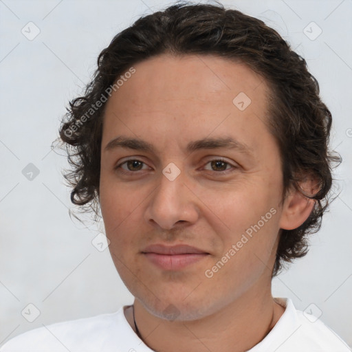 Joyful white adult female with short  brown hair and brown eyes