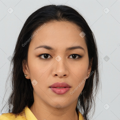 Joyful asian young-adult female with long  brown hair and brown eyes