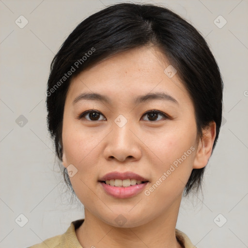 Joyful asian young-adult female with medium  brown hair and brown eyes