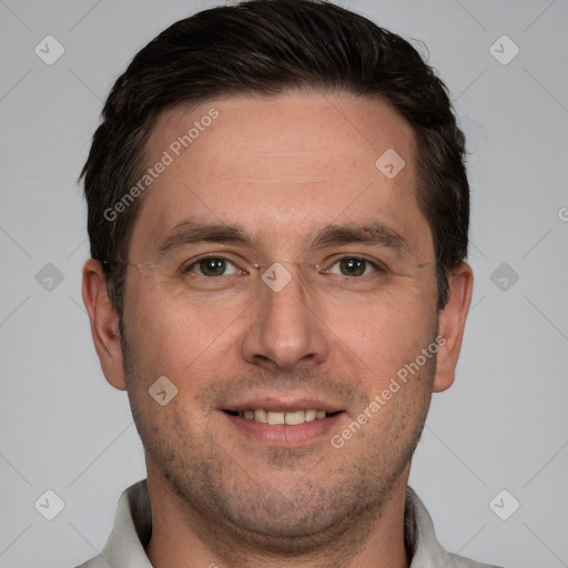 Joyful white adult male with short  brown hair and brown eyes