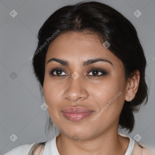 Joyful latino young-adult female with medium  brown hair and brown eyes