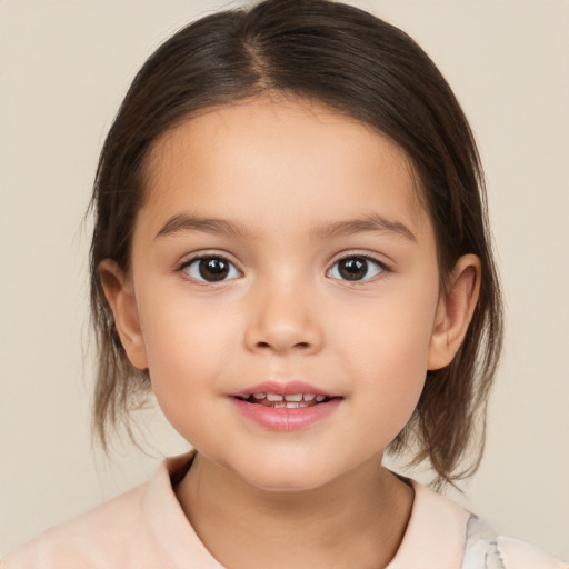 Joyful white child female with medium  brown hair and brown eyes