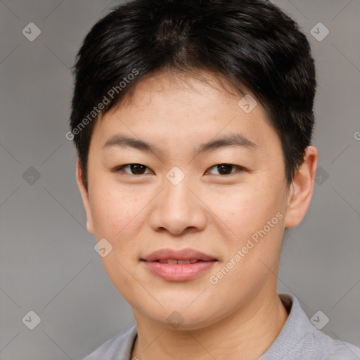 Joyful asian young-adult female with short  brown hair and brown eyes