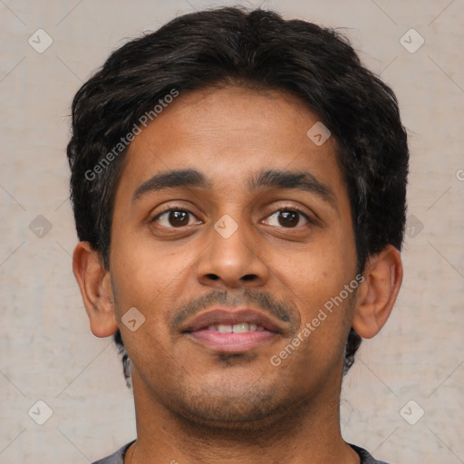 Joyful latino young-adult male with short  brown hair and brown eyes