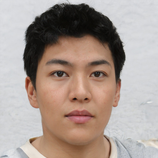 Neutral asian young-adult male with short  black hair and brown eyes