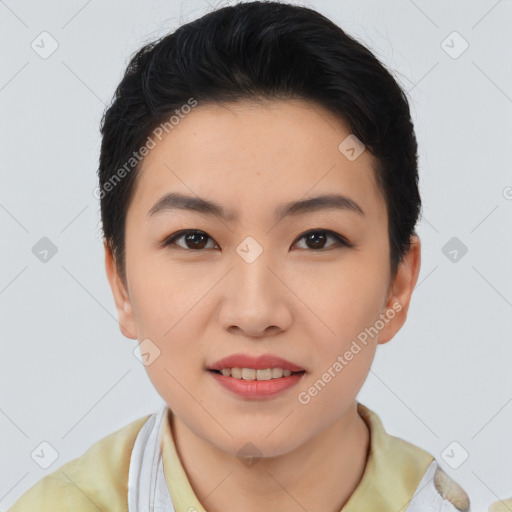 Joyful asian young-adult female with short  black hair and brown eyes