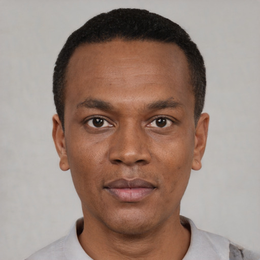 Neutral black young-adult male with short  black hair and brown eyes