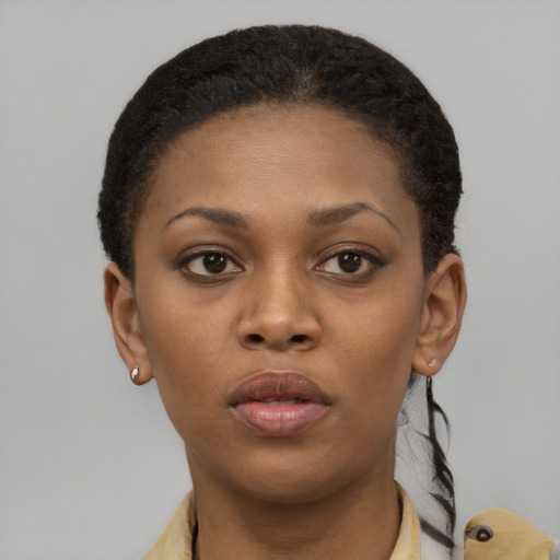 Neutral black young-adult female with short  brown hair and brown eyes