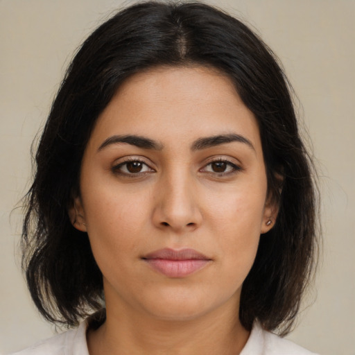 Neutral asian young-adult female with medium  brown hair and brown eyes