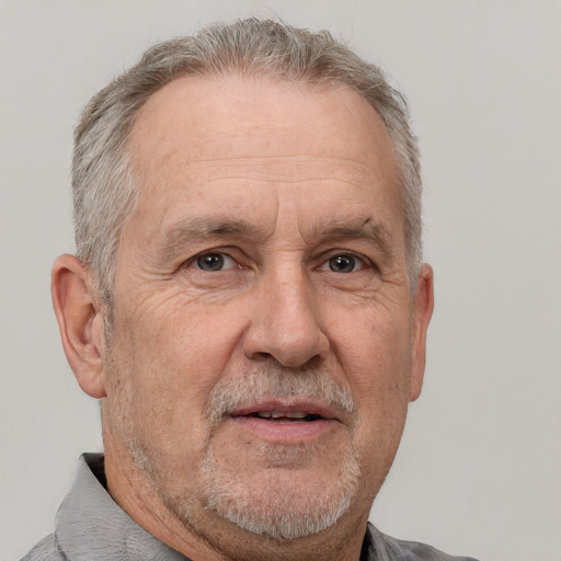 Neutral white middle-aged male with short  gray hair and brown eyes