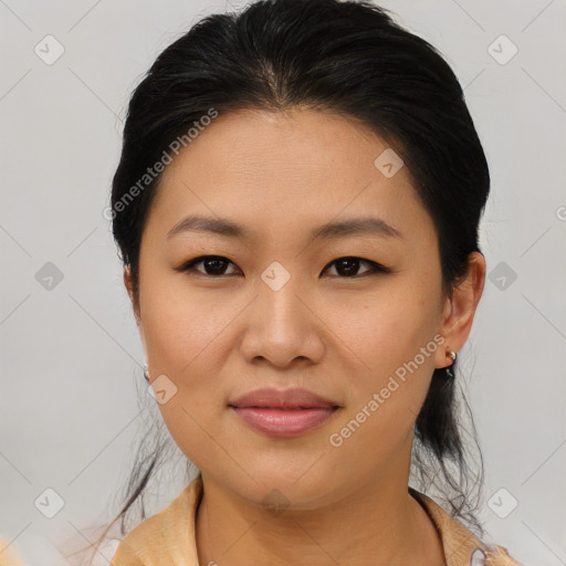 Joyful asian young-adult female with medium  brown hair and brown eyes