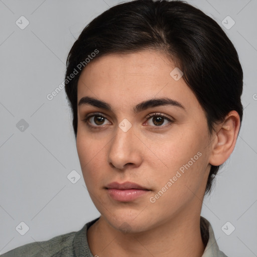 Neutral white young-adult female with medium  brown hair and brown eyes