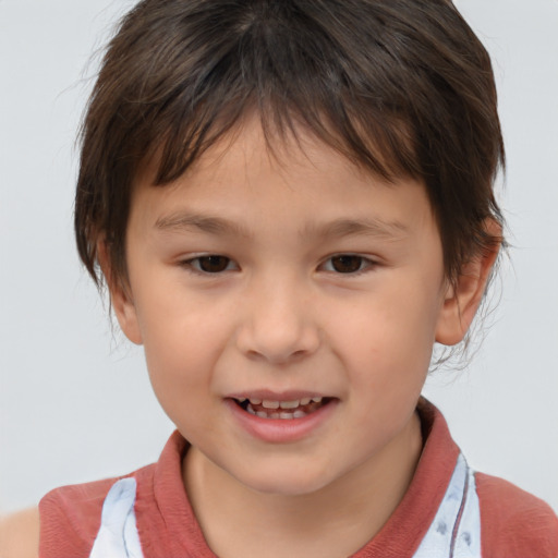 Joyful white child female with short  brown hair and brown eyes