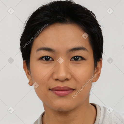 Joyful asian young-adult female with short  black hair and brown eyes