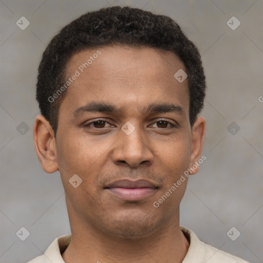 Joyful latino young-adult male with short  brown hair and brown eyes