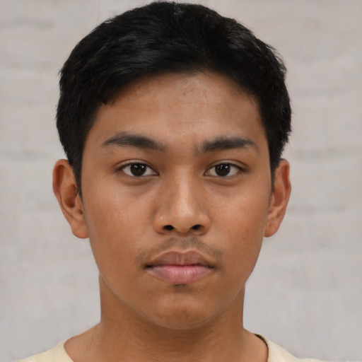 Neutral asian young-adult male with short  black hair and brown eyes