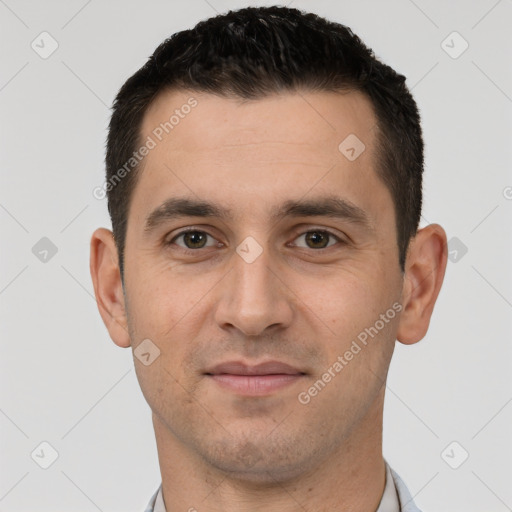 Joyful white young-adult male with short  brown hair and brown eyes