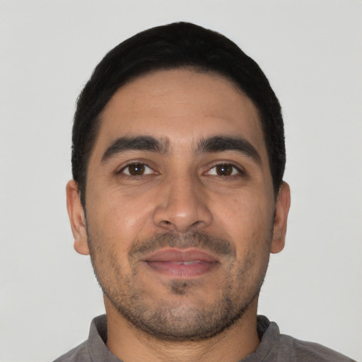 Neutral latino young-adult male with short  black hair and brown eyes