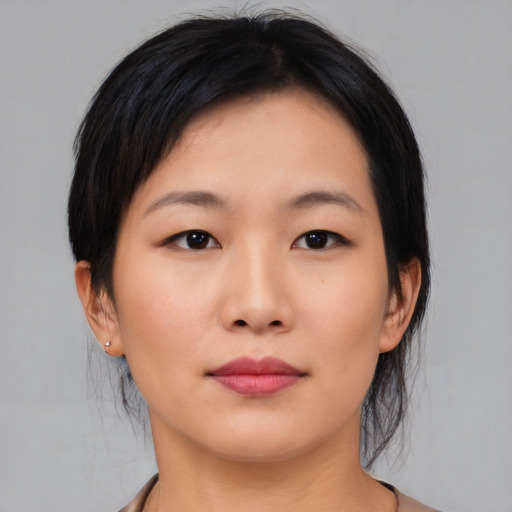 Neutral asian young-adult female with medium  black hair and brown eyes