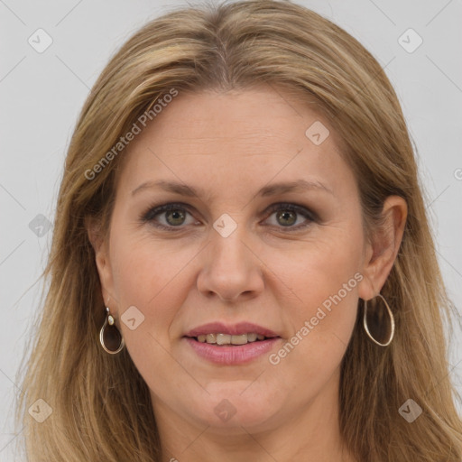 Joyful white adult female with long  brown hair and brown eyes