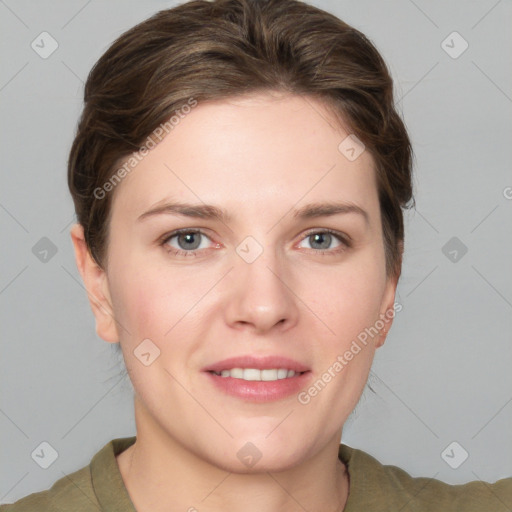 Joyful white young-adult female with medium  brown hair and grey eyes