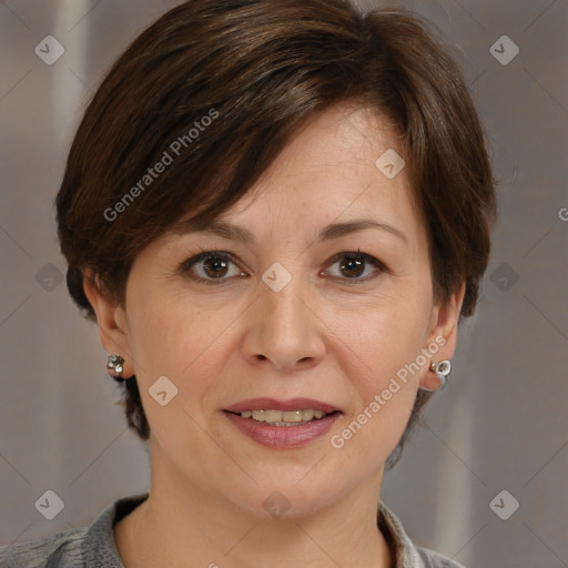 Joyful white adult female with medium  brown hair and brown eyes