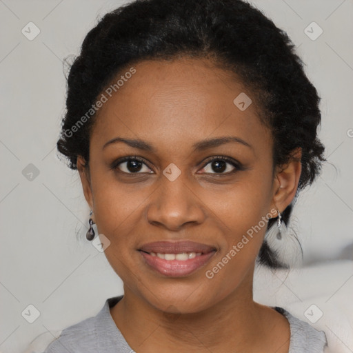 Joyful black young-adult female with medium  black hair and brown eyes