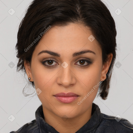 Joyful latino young-adult female with medium  brown hair and brown eyes