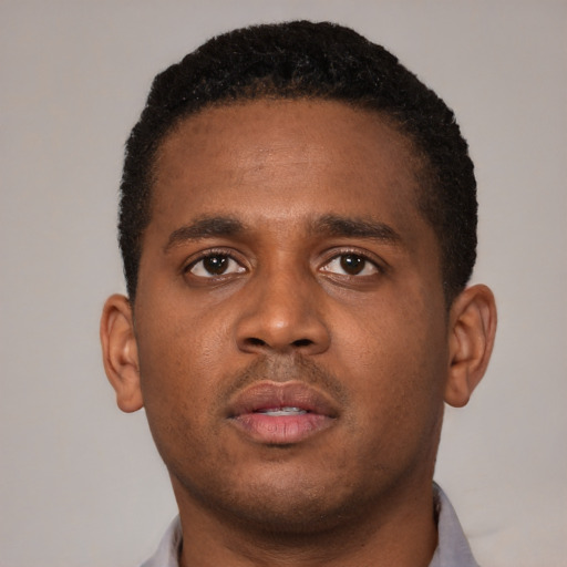 Neutral latino young-adult male with short  brown hair and brown eyes