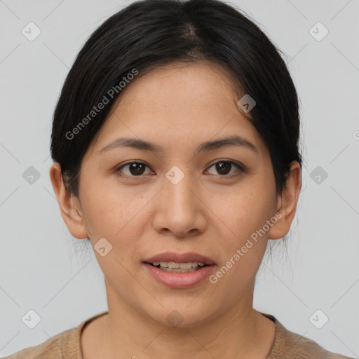 Joyful asian young-adult female with medium  brown hair and brown eyes