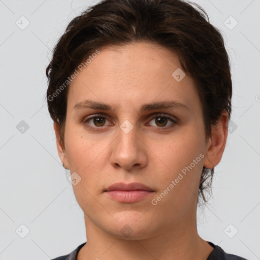 Neutral white young-adult female with short  brown hair and brown eyes