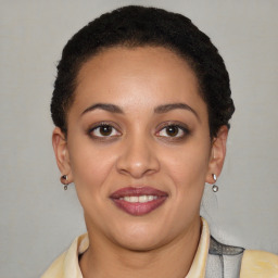 Joyful latino young-adult female with short  brown hair and brown eyes