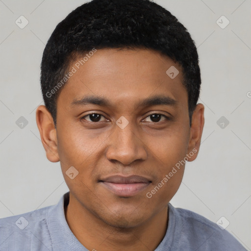 Joyful latino young-adult male with short  black hair and brown eyes