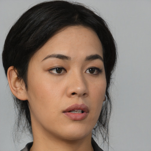 Neutral asian young-adult female with medium  black hair and brown eyes